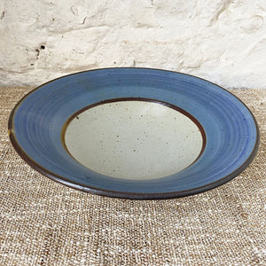 Blue rimmed thrown Brewery Pottery bowl. Using a handmade bowl is a great way to enjoy and enhance your favorite meals. Whether you're eating alone or serving a friends, using handmade ceramic bowl is a lovely way to showcase your beautifully prepared meal