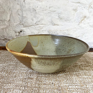 Thrown Brewery Pottery bowl with an earthy landscape pattern. Using a handmade bowl is a great way to enjoy and enhance your favorite meals. Whether you're eating alone or serving a friends, using handmade ceramic bowl is a lovely way to showcase your beautifully prepared meal.