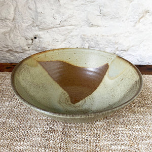 Thrown Brewery Pottery bowl with an earthy landscape pattern. Using a handmade bowl is a great way to enjoy and enhance your favorite meals. Whether you're eating alone or serving a friends, using handmade ceramic bowl is a lovely way to showcase your beautifully prepared meal.